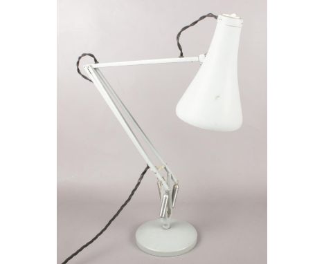 A vintage Herbert Terry anglepoise lamp. Circular base.  