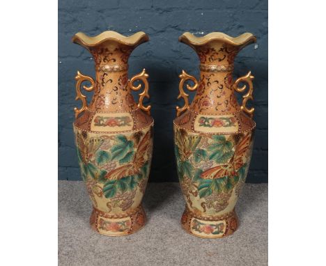 Two large ceramic decorative vases. (59cm height)  