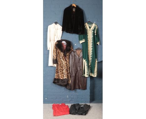 A quantity of vintage clothes. Including leather jackets, oriental style robe, leopard print 3/4 coat , etc.  