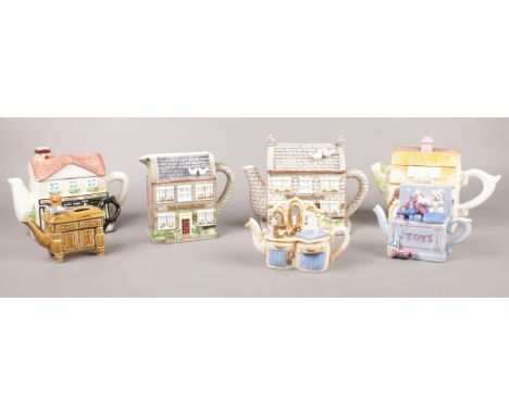 A group of ceramic teapots. Western House 'Emmerdale' The Woolpack teapot &amp; Jug etc  