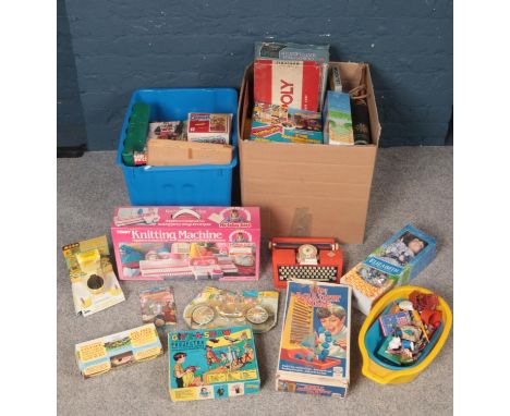 Two boxes of vintage board games and toys. Including Monopoly, figures, battleship, dolls, jigsaws, etc.  