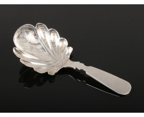 A George IV silver caddy spoon assayed Birmingham 1830.  