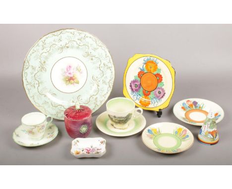A small quantity of named ceramics. To include five pieces of Clarice Cliff of various designs, a Royal Worcester plate paint