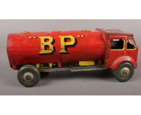 A British clockwork tinplate fuel tanker. with Shell &amp; BP Ltd advertising.  