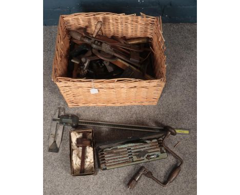 A quantity of tools. Including hand crank screwdrivers, Absolute Digimatic caliper, vintage try squares, etc.  