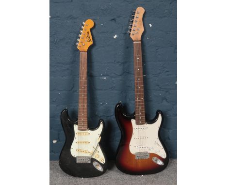Two electric guitars. To include a 3/4 Jim Deacon six string guitar and a Stagg six string guitar.  Condition fair. Both guit