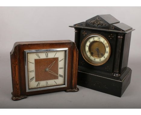 A Victorian slate mantel clock along with an oak clock.  
