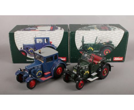 Two boxed Schuco die-cast scale models of cars. To include two styles of Lanz Bulldogs - No 00125 &amp; No 00120. Scale 1:18.