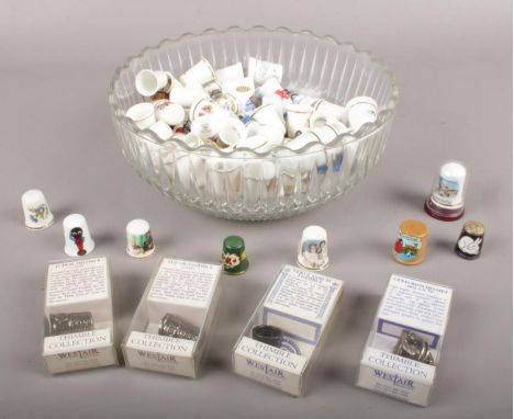 A quantity of thimbles. Including ceramic, metal , Disney, hand painted examples, etc.  