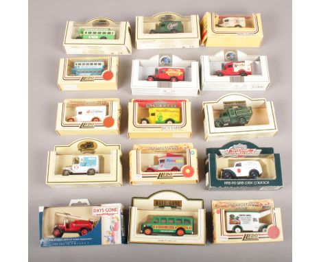 A collection of 20 Lledo die cast vehicles. Dennis Fire Engine (London Fire Brigade), 1950 Morris Z Van ( Malvern Water), 195