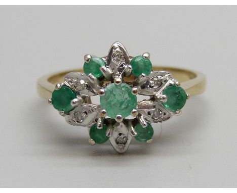 A 9ct gold, diamond and emerald ring, 2.3g, K 