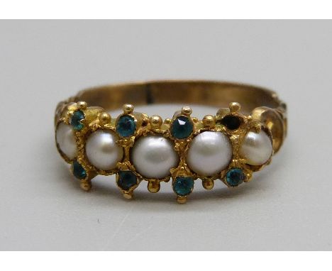 A Victorian yellow metal seed pearl and blue stone ring, one blue stone and two pearls missing, 1.9g, P 