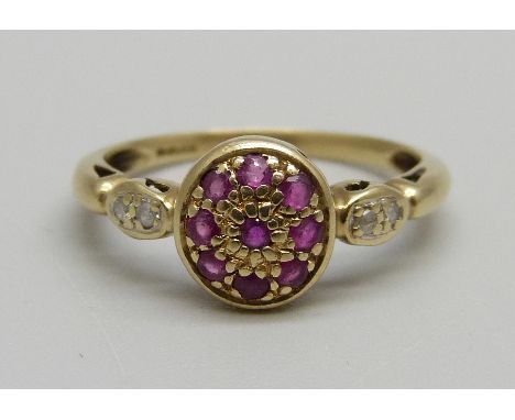 A 9ct gold, ruby and diamond ring, 1.7g, N 