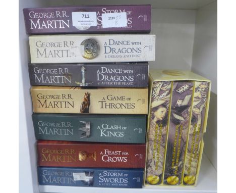 Seven George R. R. Martin books and a Complete Lewis Carroll three book set in slip case 