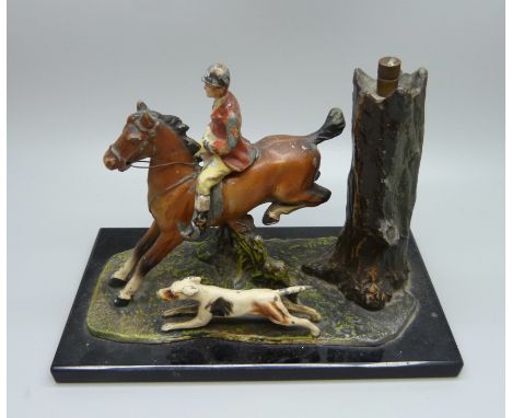 A painted huntsman and hound table lighter, base 15cm 