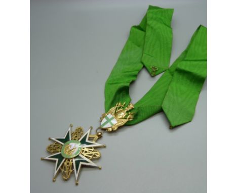 An enamel and gilt metal medallion on a green sash, Order of Saint Lazarus of Jerusalem 