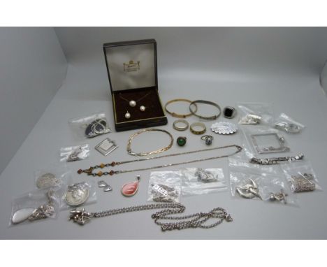 A collection of silver jewellery including a hallmarked Victorian silver brooch depicting East Dereham Church, bangle, rings,