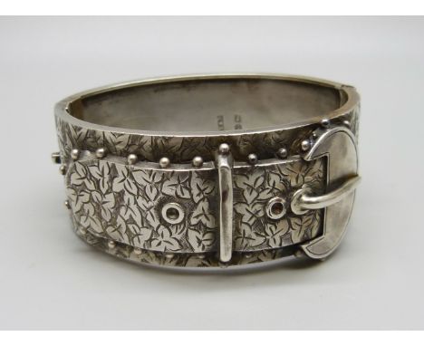 A Victorian silver buckle bangle, Birmingham 1884, 30g 