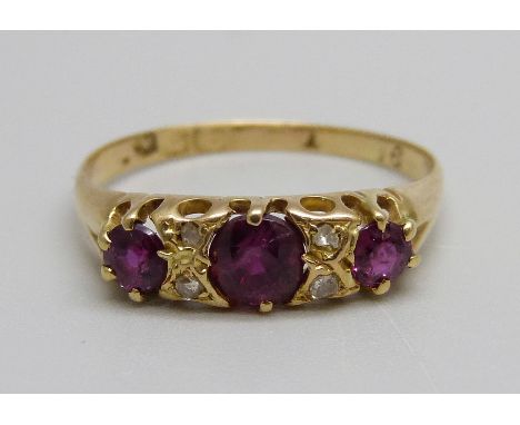 A 18ct gold, ruby and diamond ring, one diamond replaced, 2.3g, Q 