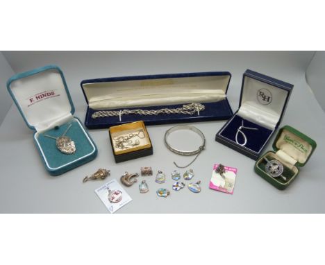 Silver jewellery including a bangle and silver charms 