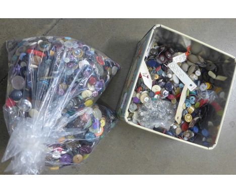 A tin and two bags of vintage buttons 