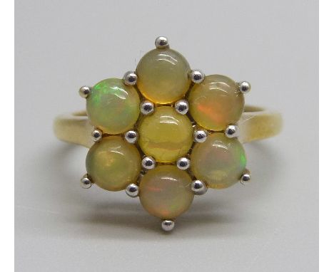 A 925 silver and Ethiopian opal cluster ring, L 