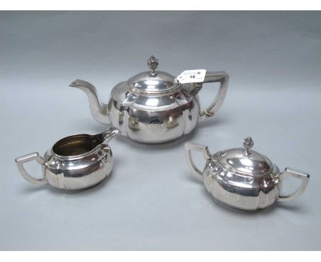 A Chinese Three Piece Teaset, comprising teapot, cream jug and sugar bowl, each allover planished finish with gadrooned accen