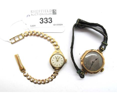 Regency; A 9ct Gold Cased Ladies Wristwatch, the signed white dial with gilted baton markers, within shaped plain case, (move