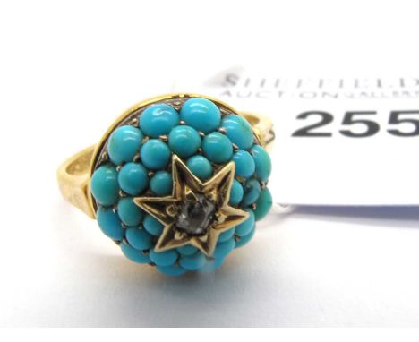 A Victorian Diamond and Turquoise Etruscan Ring, the old cut diamond set to star-shaped setting, within a graduated turquoise