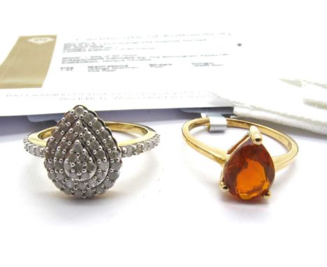 The Genuine Gemstone Company; A 9ct Gold 3/4ct Diamond Cluster Ring, of teardrop shape, claw set throughout (finger size N1/2