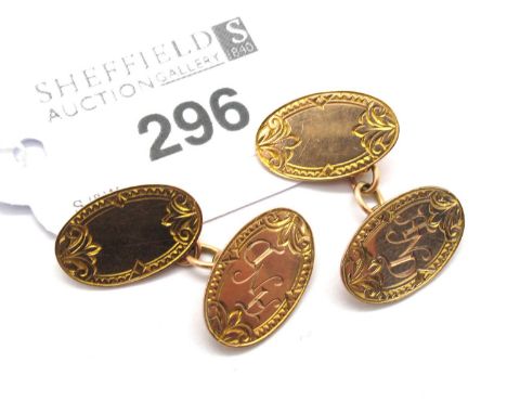 A Pair of Chester 9ct Rose Gold Cufflinks, the oval panels of foliage design with geometric style border, initialled "AND", t