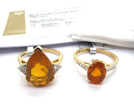 The Genuine Gemstone Company; A 9ct Gold Orange American Fire Opal & White Zircon Ring, of teardrop shape between stone set s