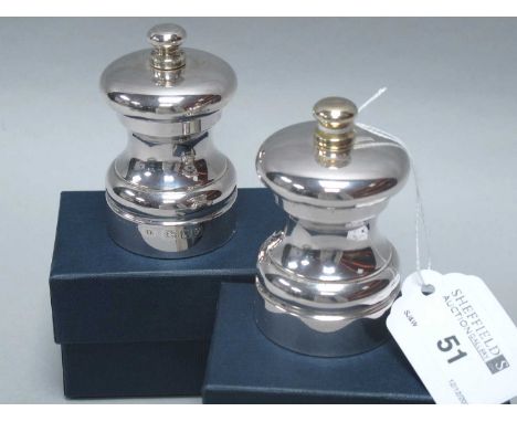 A Pair of Hallmarked Silver Salt and Pepper Mills, JBLd, London 1998, of gadrooned design, 7cm high. (2)