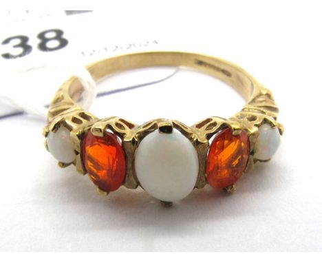 A Vintage 9ct Gold Five Stone Ring, the alternate set stones of graduated size, claw set within decorative style setting and 