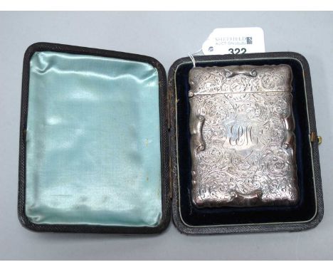 Walker &amp; Hall; A Hallmarked Silver Card Case, Sheffield 1927, allover foliage engraved with scroll edges in relief, monog