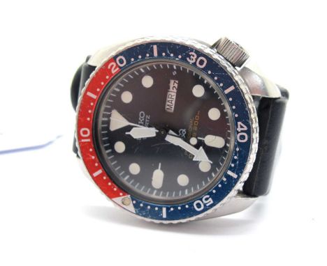 Seiko; Professional Diver's 200m Gent's Pepsi Style Quartz Wristwatch, the signed dial with luminus markers and date day aper