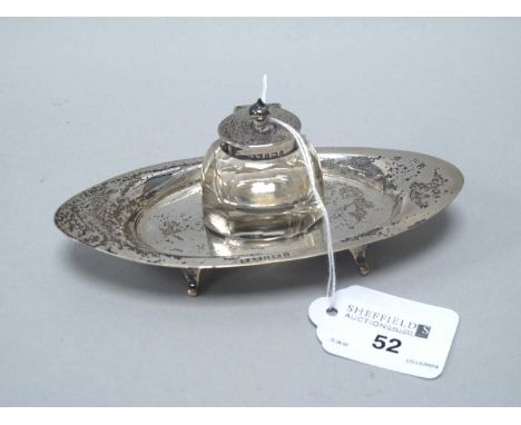 An Edwardian Hallmarked Silver Ink Stand, W.H.W, Birmingham 1903, of boat form with removable hallmarked silver mounted glass