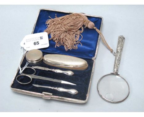 An Art Deco Hallmarked Silver Cased Manicure Set, (makers mark rubbed), Birmingham 1924, the case of plain design housing nai