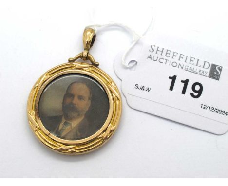 A Victorian 9ct Gold Openface Locket Pendant, the male portrait within decorative surround, suspended on a scroll cap surmoun