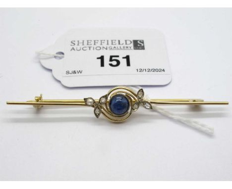 An Old Cut Diamond and Cabochon Set Bar Brooch, the cabochon stone circular collet set between diamond set crossover setting 