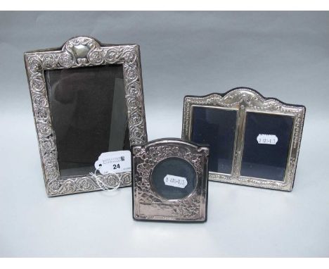 Carrs of Sheffield; A Hallmarked Silver Mounted Double Photograph Frame, Sheffield 2008, of decorative draping design in reli