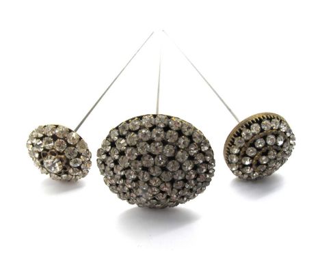 Three Vintage Clear Paste Hatpins, all of circular cluster form, claw set throughout. (3)