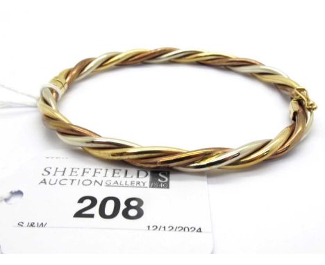 A 9ct Tri-Colour Gold Hinged Bangle, of twisted weave design, the snap clasp with safety clip (9.8grams).