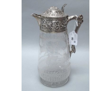 A Victorian Hallmarked Silver Mounted Claret Jug, WSGS, (Sheffield 1886?), with foliage and scrollwork decoration in relief, 