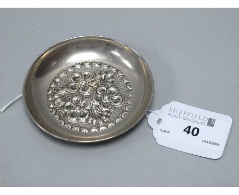 A Highly Decorative Trinket Dish, of flowerhead design in relief with scalloped border, stamped "SILVER 830".