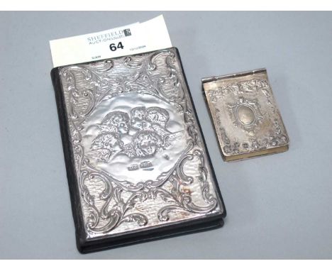 A Hallmarked Silver Mounted Address Book, KFLd, London 1989, with cherub and scroll scene in relief, embossed "LEATHER" verso