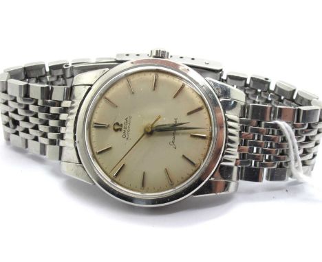 Omega; A Vintage Seamaster Automatic Gent's Wristwatch, the signed champagne dial with gilt baton markers, (movement unseen),