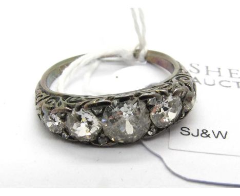 An Antique Style Five Stone Diamond Ring, of boat form, the graduated brilliant cut diamonds alternately set with old cut dia