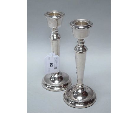 A Hallmarked Silver Candlestick, A.T.C, Sheffield 1973, of gadrooned form with beaded decoration, on circular spreading base 