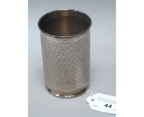 A Geometrical Tumbler, with chased hexagonal decoration and brushed finish, on circular base stamped "STERLING SILVER RSA", 9